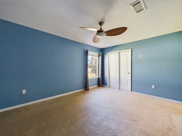 3098 Border Creek Dr, Crestview, FL 32539 - unfurnished bedroom featuring a closet, visible vents, carpet flooring, ceiling fan, and baseboards