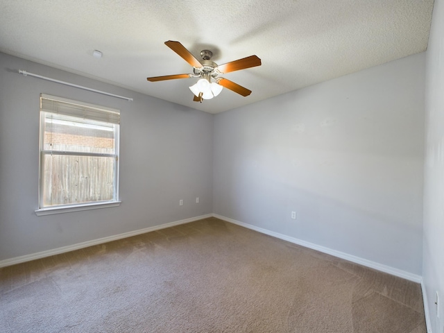 3098 Border Creek Dr, Crestview, FL 32539 - carpeted spare room featuring a ceiling fan, a textured ceiling, and baseboards