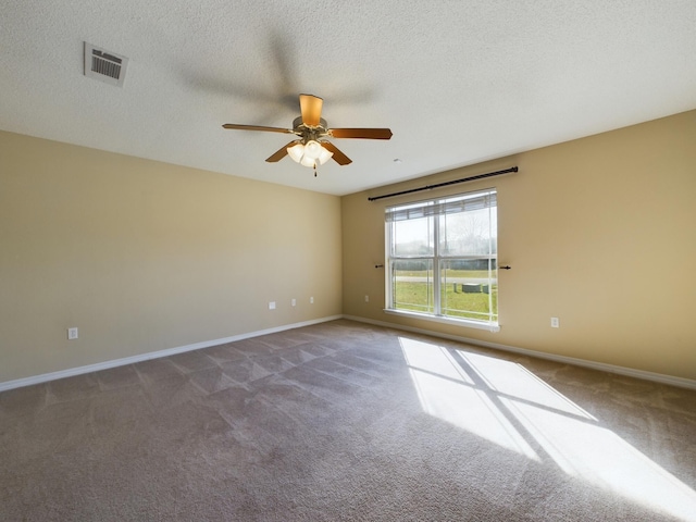 3098 Border Creek Dr, Crestview, FL 32539 - carpeted spare room featuring a ceiling fan, visible vents, a textured ceiling, and baseboards