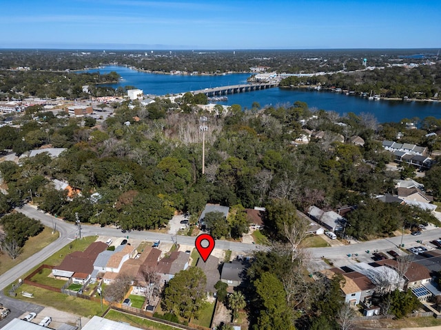 bird's eye view featuring a water view and a residential view