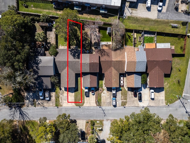 birds eye view of property with a residential view