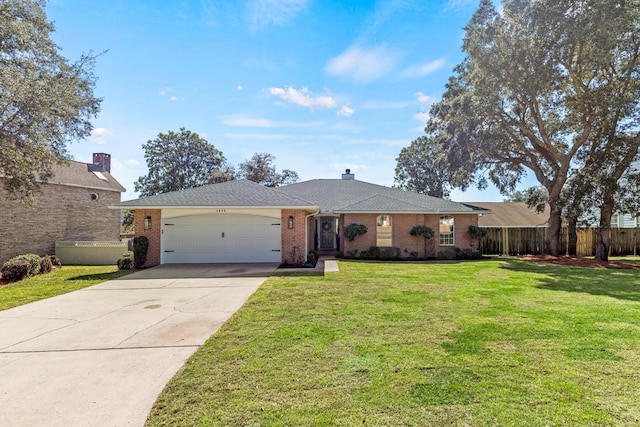 ranch-style home with driveway, an attached garage, fence, a front yard, and brick siding