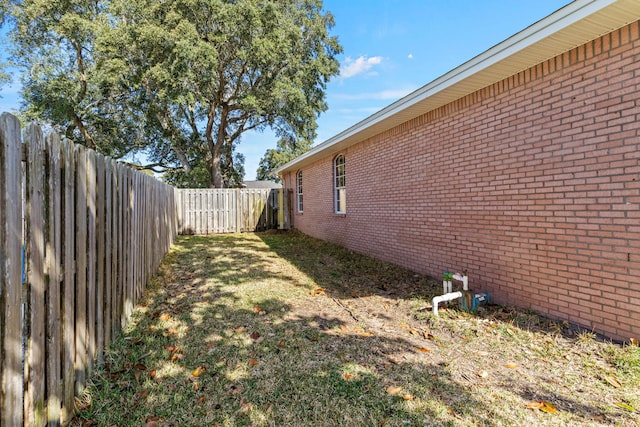 view of yard featuring a fenced backyard