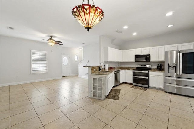 kitchen with light tile patterned floors, visible vents, appliances with stainless steel finishes, and a sink