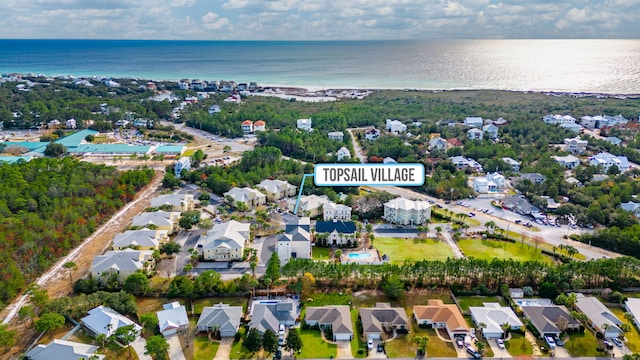 bird's eye view with a water view and a residential view