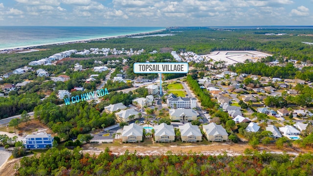 bird's eye view featuring a residential view and a water view