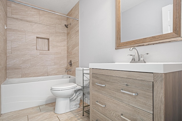 full bath featuring toilet, shower / bathtub combination, a textured ceiling, and vanity