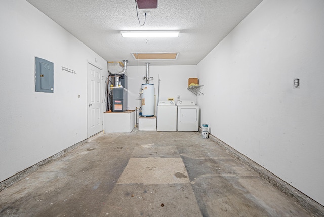 garage with water heater, independent washer and dryer, electric panel, and heating unit