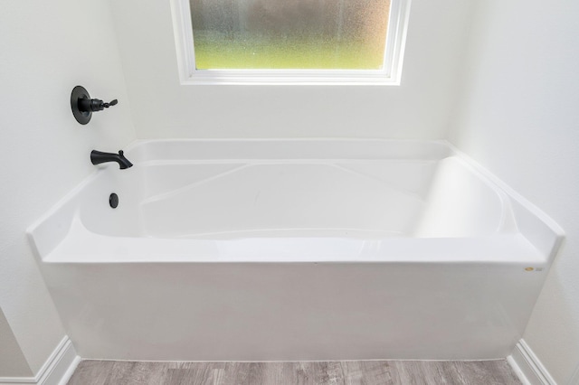 bathroom with wood finished floors