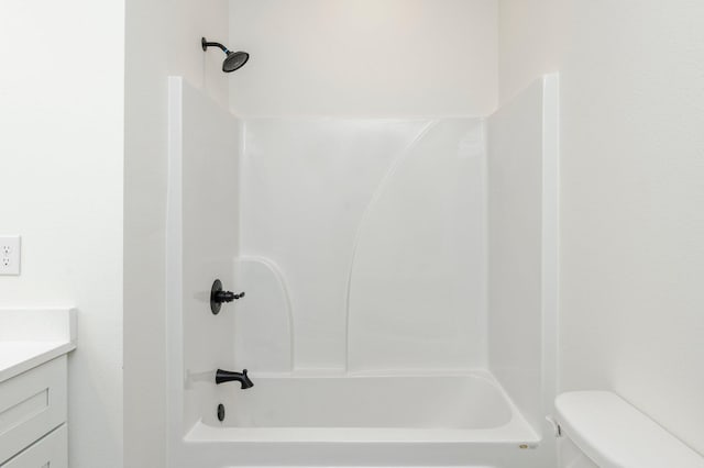 full bath featuring toilet, shower / washtub combination, and vanity