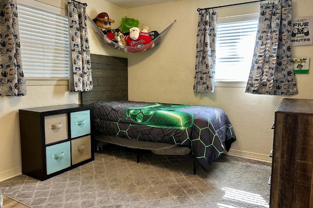 bedroom with baseboards