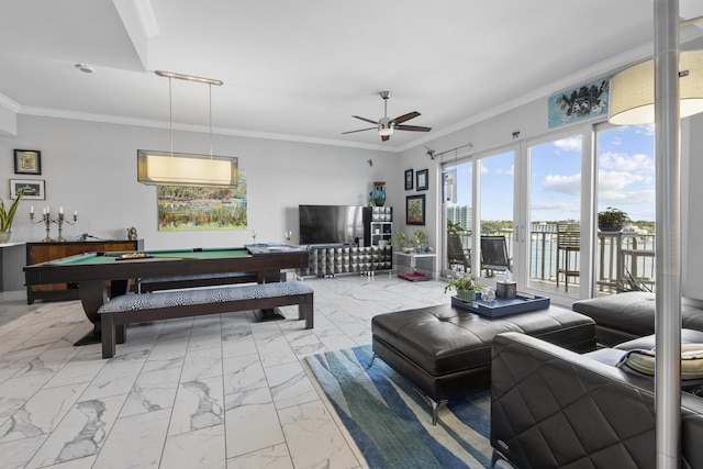 living area with marble finish floor, ornamental molding, billiards, and a ceiling fan