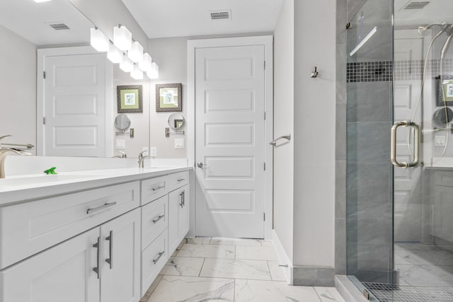 full bathroom with a sink, visible vents, marble finish floor, a shower stall, and double vanity