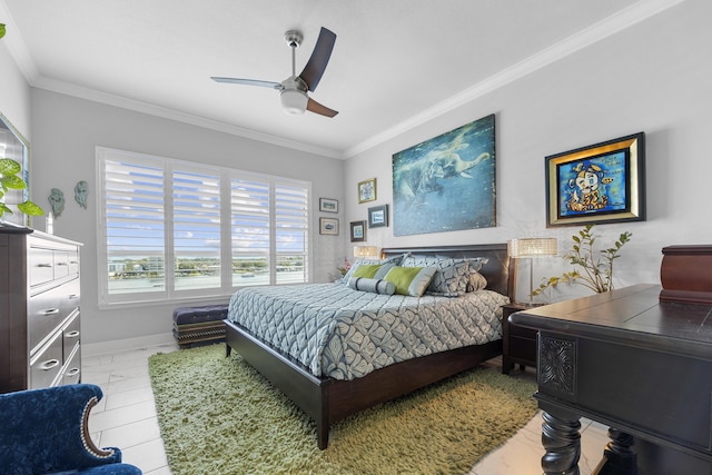 bedroom featuring a ceiling fan, crown molding, and baseboards