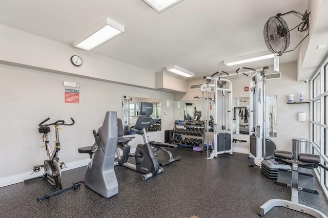 gym with visible vents and baseboards