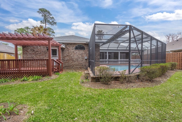 exterior space with a fenced in pool, glass enclosure, fence, and a deck