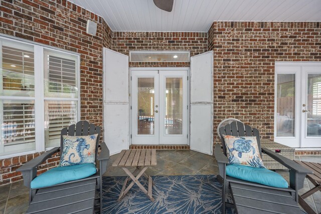 view of patio / terrace featuring french doors and ceiling fan