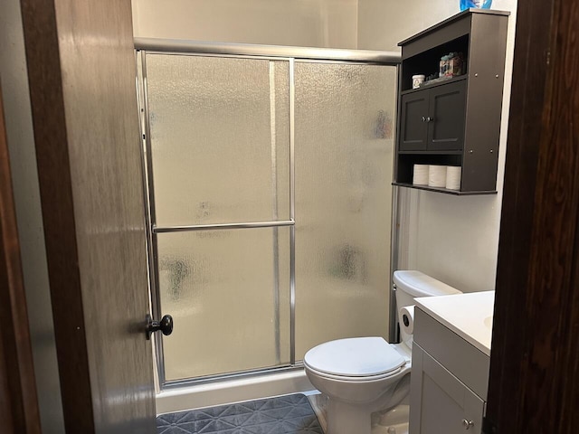223 W Pinoak Ct, Crestview, FL 32539 - bathroom with a stall shower, vanity, and toilet