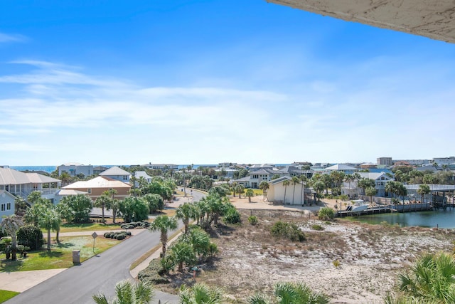 bird's eye view featuring a residential view and a water view