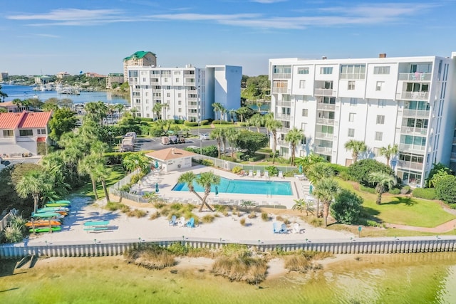 view of swimming pool featuring a water view