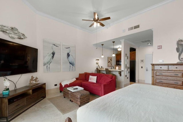 bedroom with visible vents and crown molding