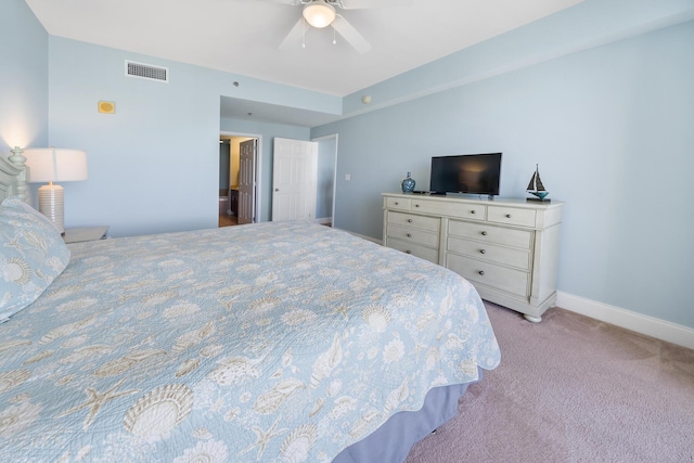 bedroom featuring light carpet, ceiling fan, visible vents, and baseboards