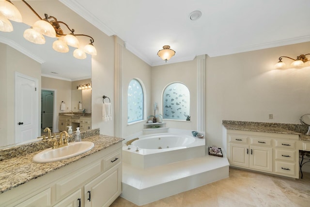 bathroom with a tub with jets, ornamental molding, tile patterned floors, a sink, and two vanities