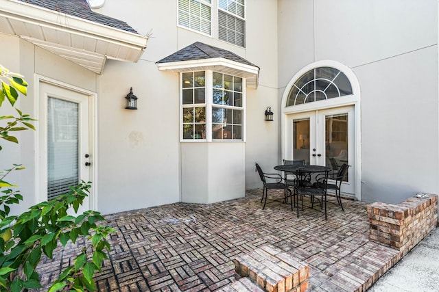 view of patio / terrace with french doors and outdoor dining area