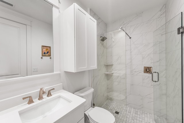 bathroom with toilet, a stall shower, visible vents, and vanity