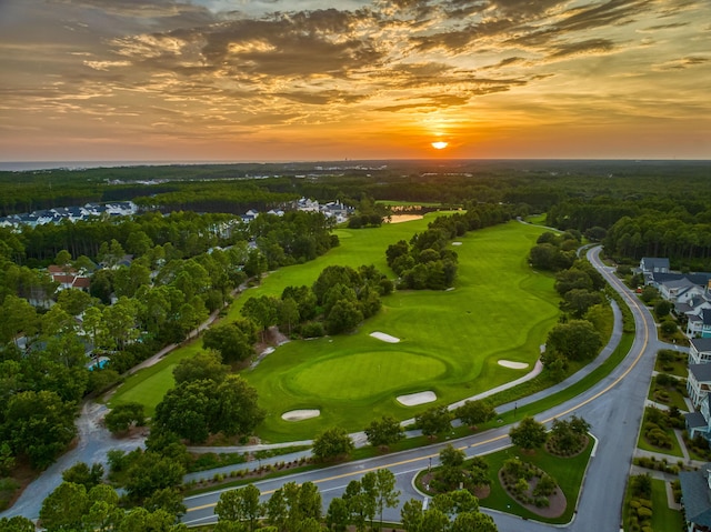 bird's eye view with view of golf course