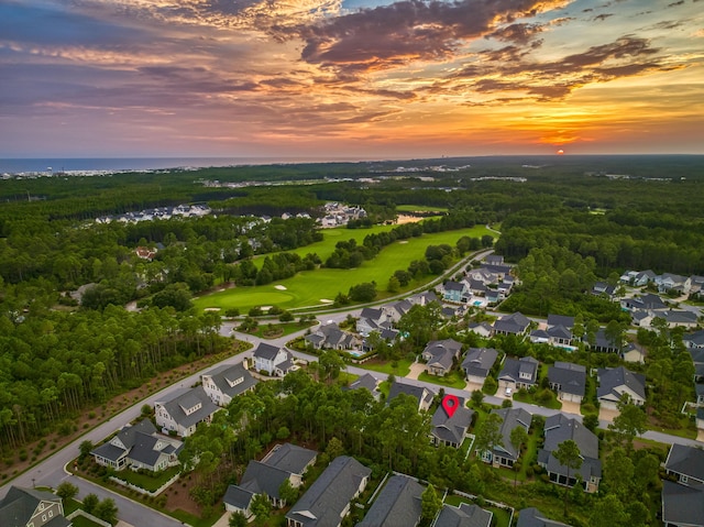 aerial view at dusk with a residential view