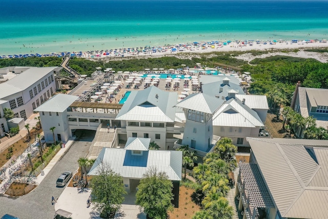 aerial view featuring a water view and a beach view