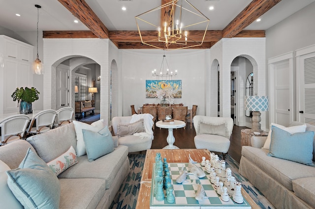 living area featuring arched walkways, wood finished floors, an inviting chandelier, beam ceiling, and recessed lighting