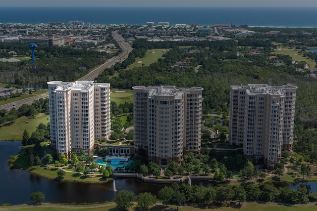 bird's eye view featuring a water view and a city view