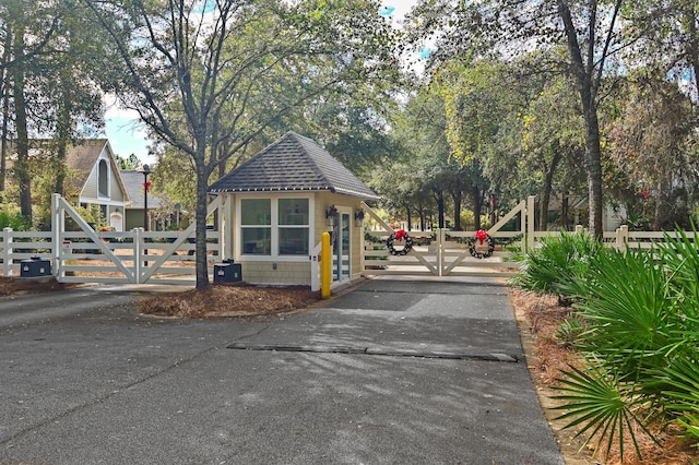 exterior space with fence and a gate