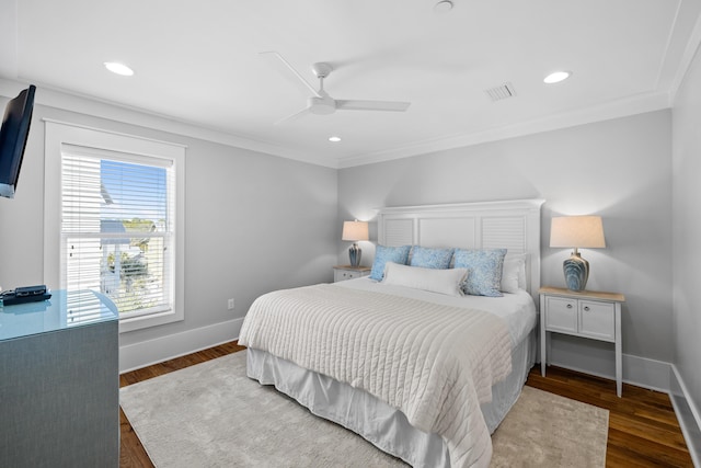 bedroom featuring dark wood-type flooring, visible vents, and baseboards