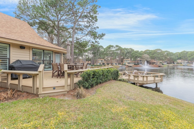 view of yard with a water view