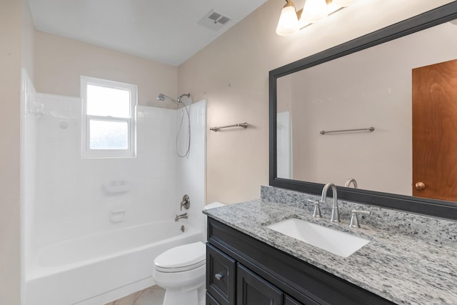 bathroom with toilet, tub / shower combination, vanity, and visible vents