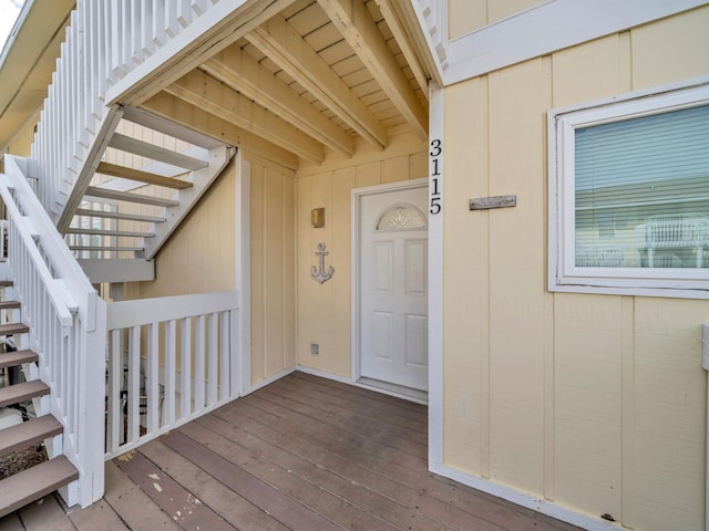 entrance to property with a deck