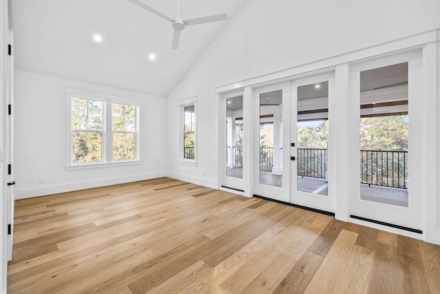 unfurnished sunroom featuring lofted ceiling and ceiling fan