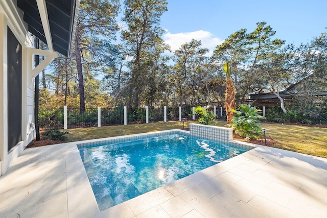 view of swimming pool featuring a fenced in pool, a fenced backyard, a patio, and a lawn