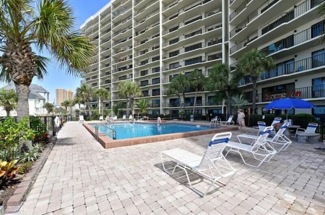 pool with a patio area