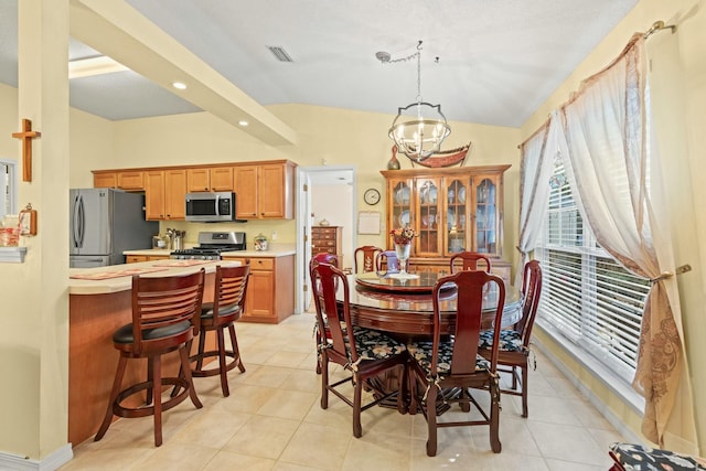 dining area with visible vents, lofted ceiling, light tile patterned flooring, a notable chandelier, and recessed lighting