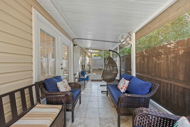 exterior space featuring french doors and fence