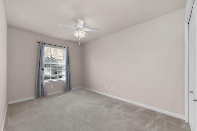 178 E Iron Horse Dr, Crestview, FL 32539 - spare room with carpet floors, a ceiling fan, and baseboards