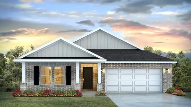 view of front of property with an attached garage, brick siding, a shingled roof, concrete driveway, and board and batten siding