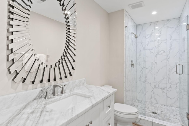 full bathroom with visible vents, toilet, a stall shower, marble finish floor, and vanity