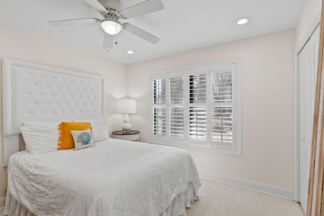 bedroom featuring baseboards, carpet floors, recessed lighting, ceiling fan, and a closet