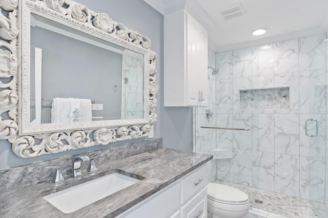 full bathroom featuring vanity, visible vents, a stall shower, crown molding, and toilet