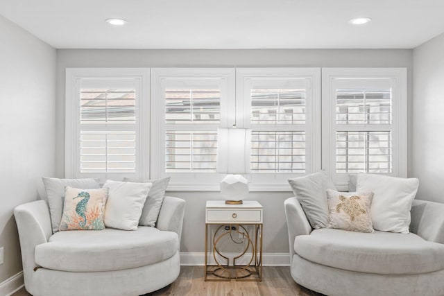 sitting room featuring recessed lighting, baseboards, and wood finished floors